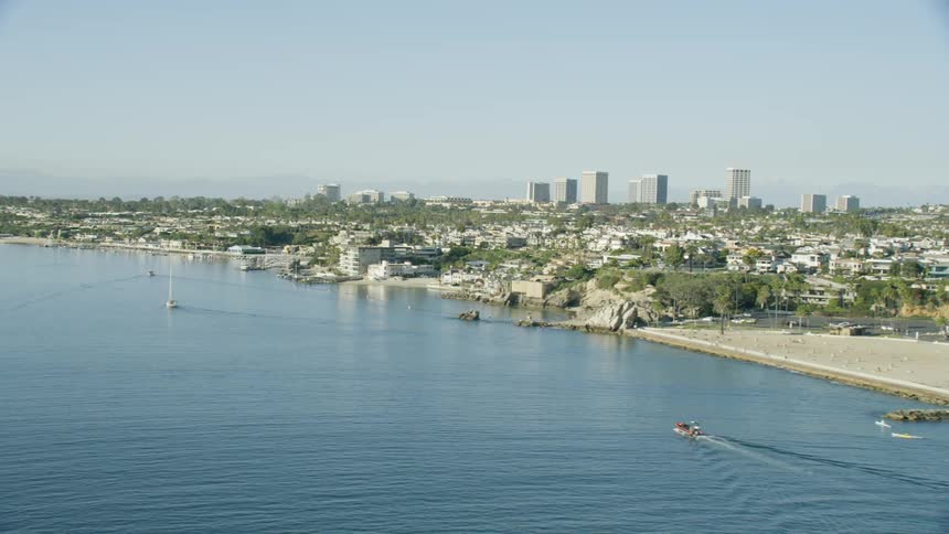 The water is calm near the shoreline