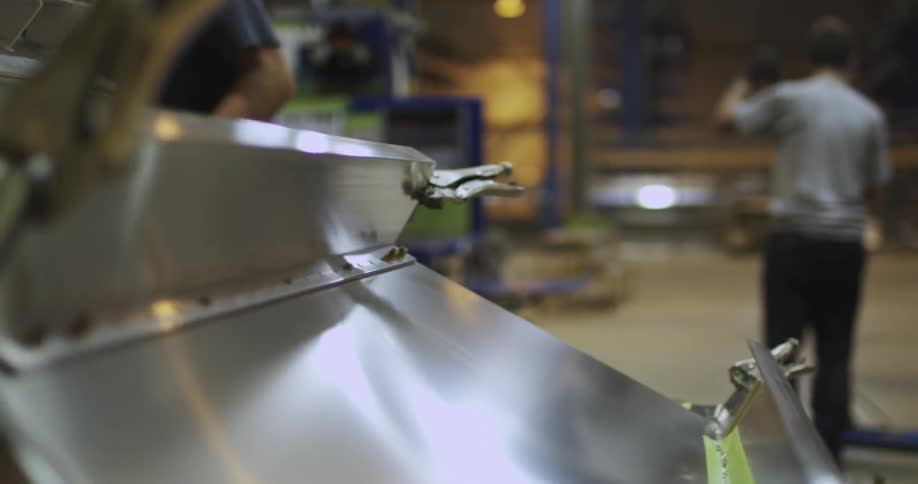 A man drills a machine