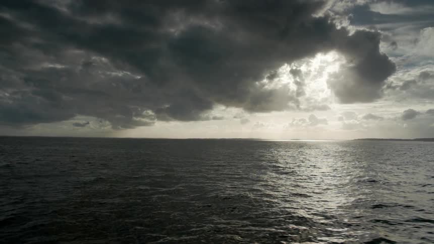 Clouds float over the ocean