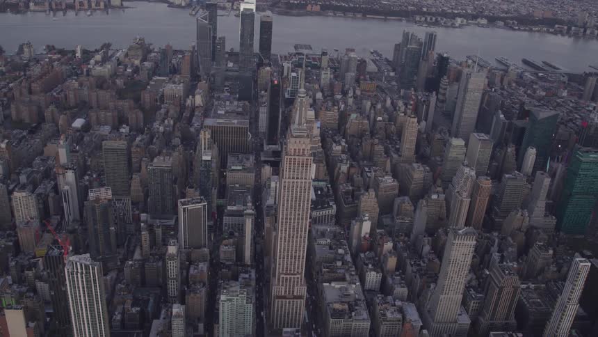 Tall buildings and skyscrapers in a metropolis near a river