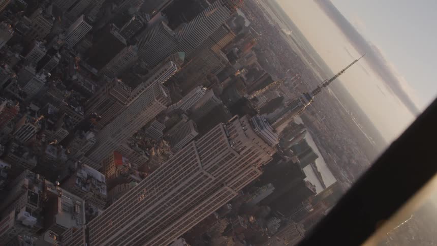 A city with buildings and skyscrapers with the sky in the background