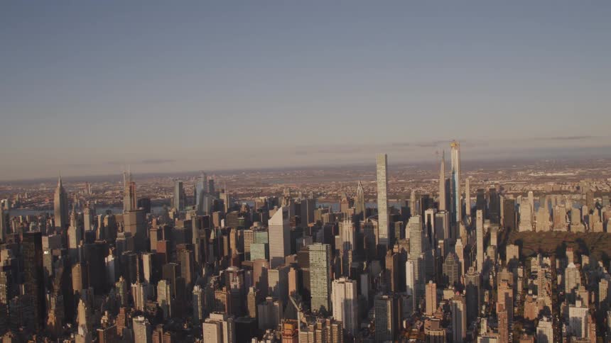 Tall buildings in a dense metropolis during the day