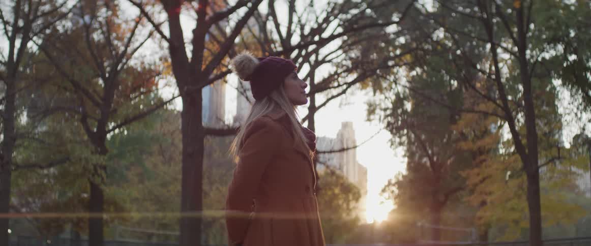 A woman is taking in the view at a park