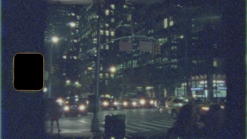 Traffic in city downtown at night caught on film