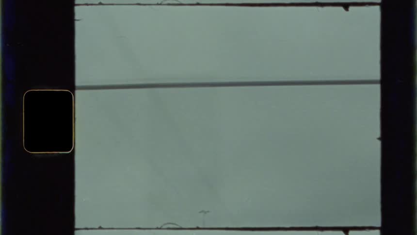 Posts and wires move past the window