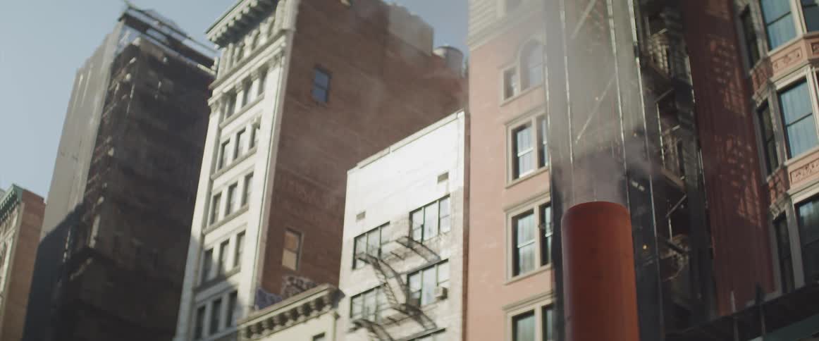 The steam rises from the chimney in the city