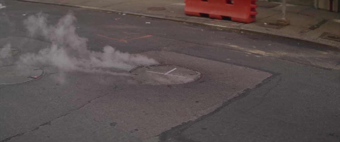 Steam flows out of the road