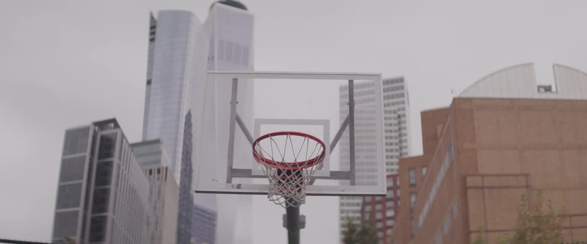 A basket ball hoop in a city