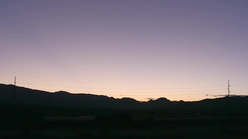 View of a mountain range at sunset