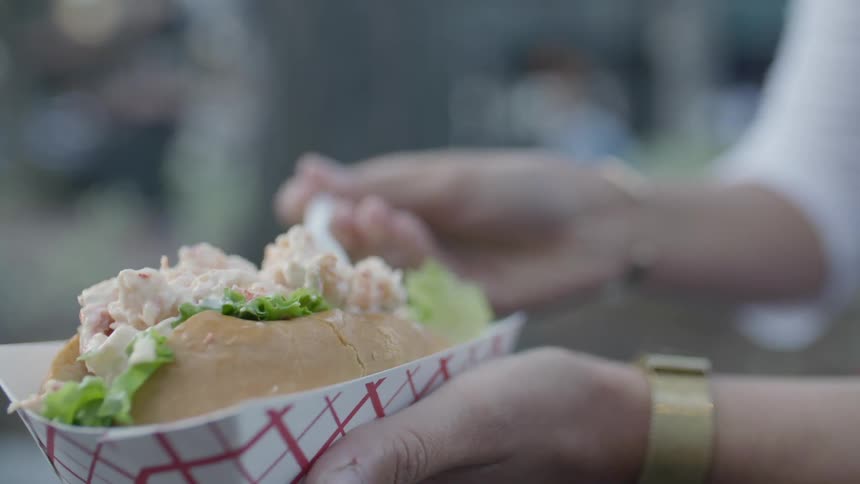 A person is eating food with a fork