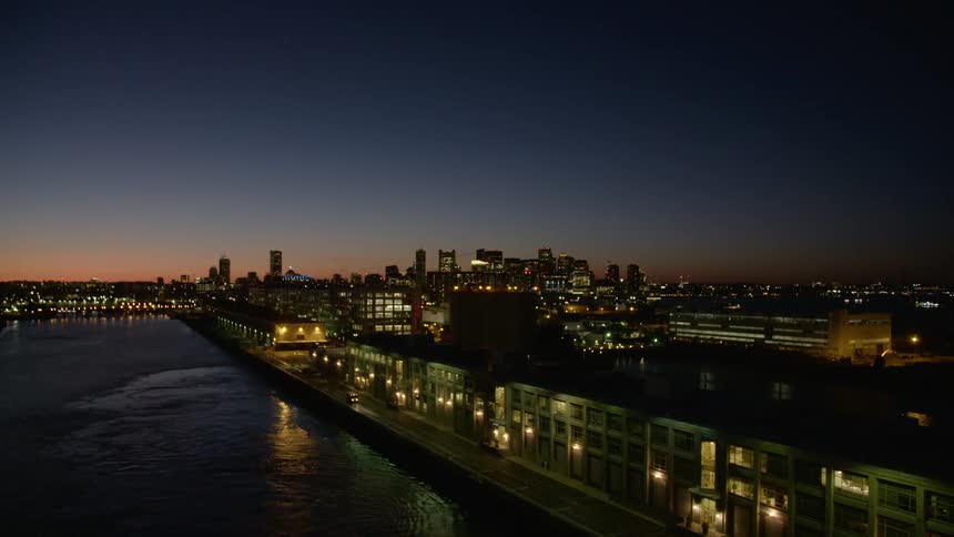 Day turns to night in a coastal city