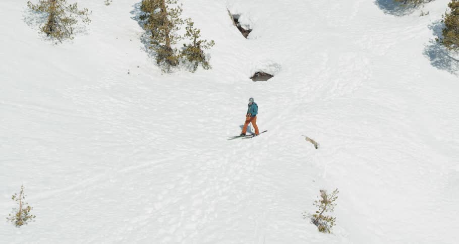 A person is skiing down the slope
