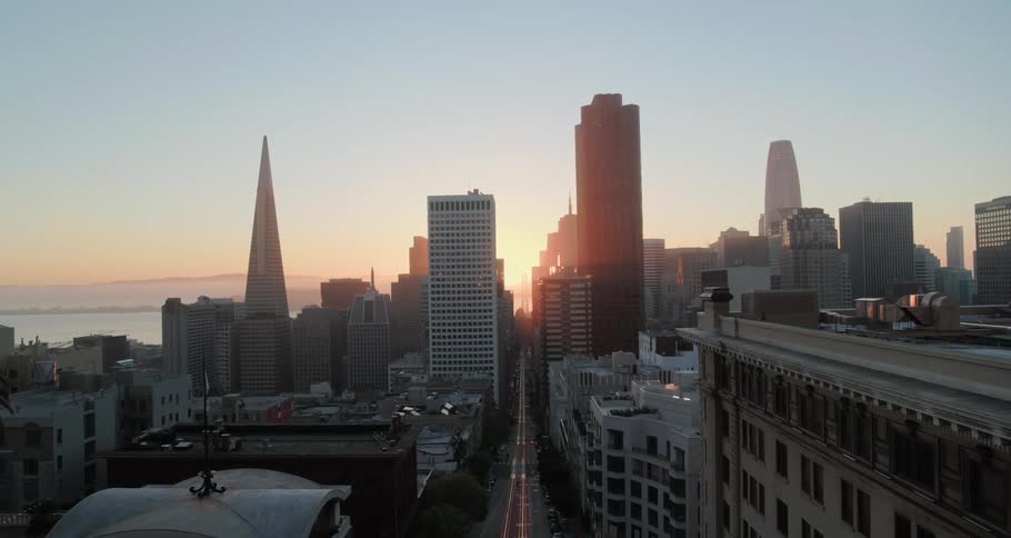 The sun sets in the distance