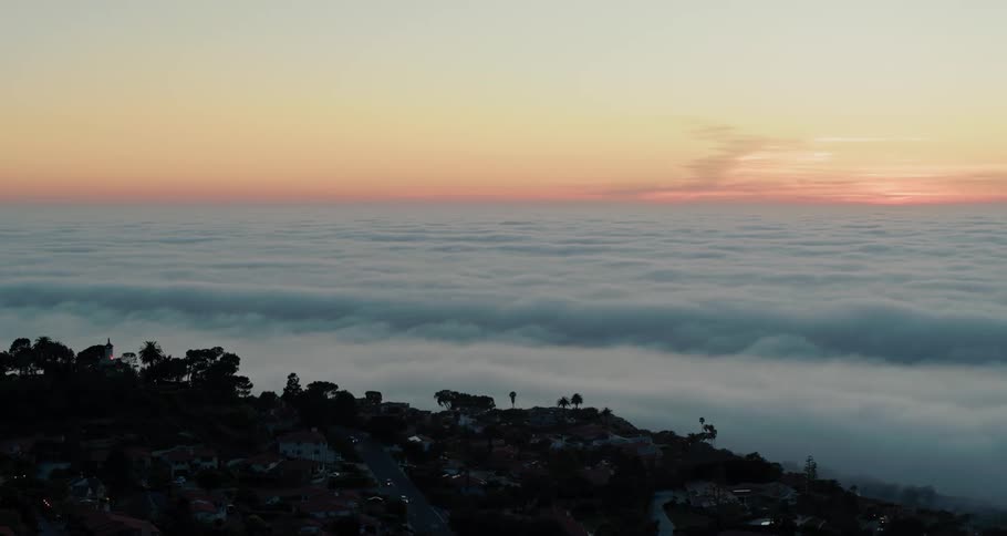Clouds moving towards a neighborhood