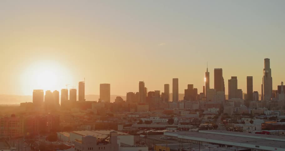 Aerial view of city skyline at sunset