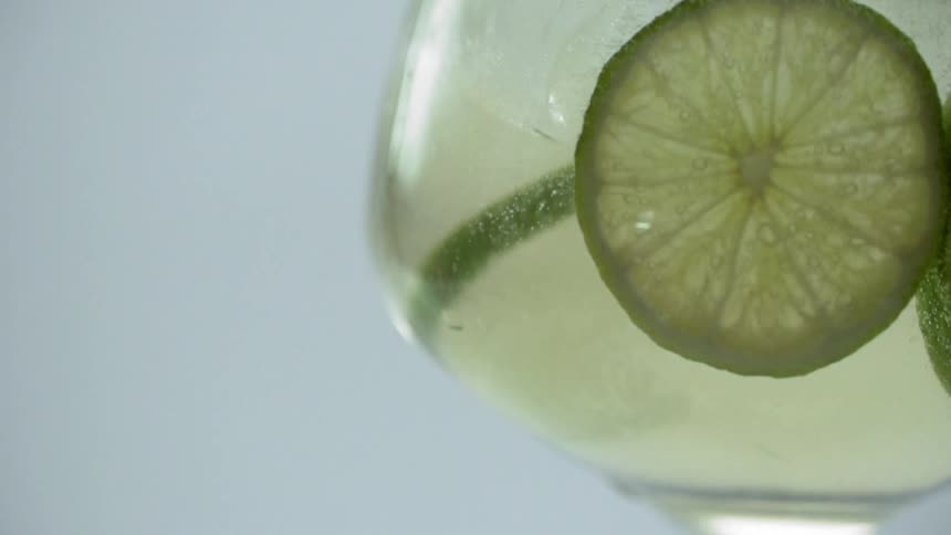 View of a jug of lemonade with lemon slices