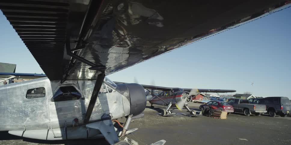 Two small planes with running props