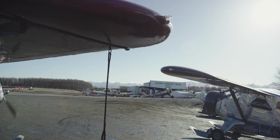 A small plane turns onto the runway
