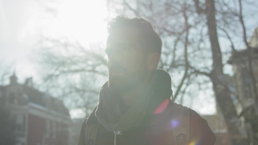 A man walks on a cold day
