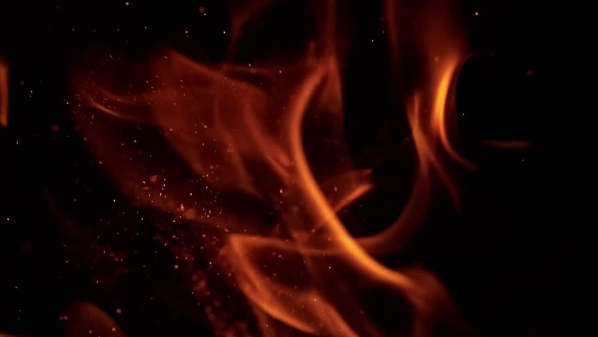Flame like digital designs float up the screen