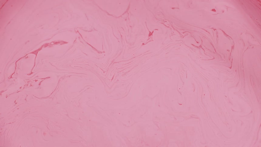 Pink paint swirling together