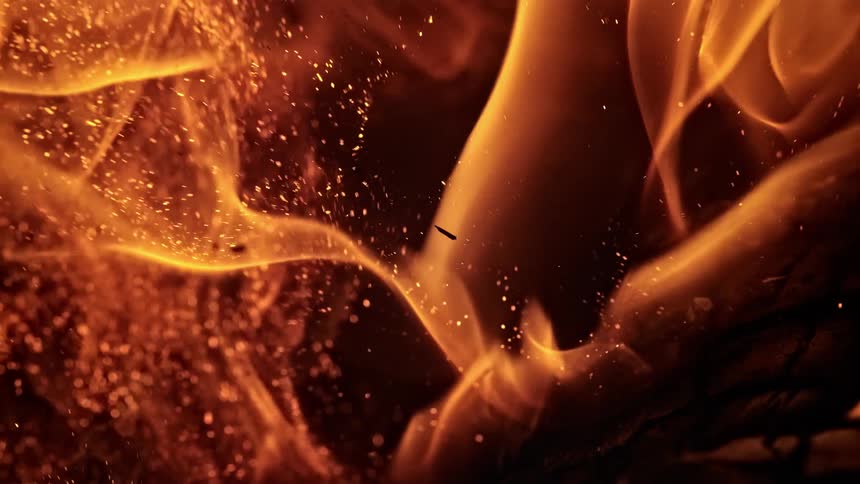 Flames rising from logs