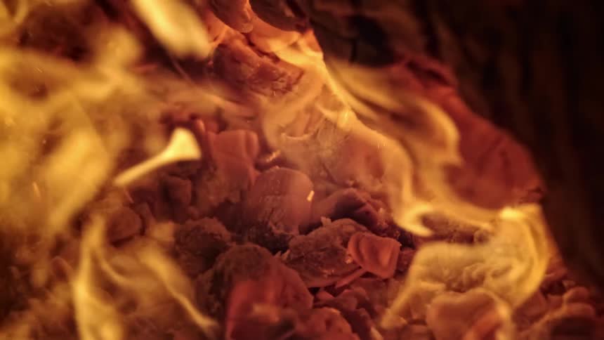Hot burning coals catch on fire