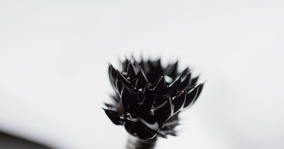 The metal sits on a screw