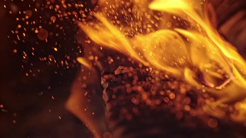 A close up of wood on fire