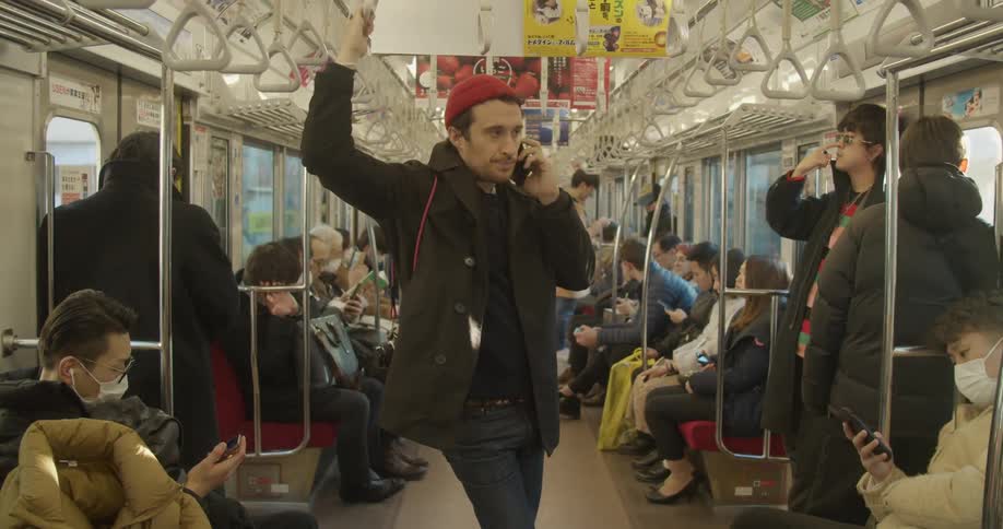 People ride the train together