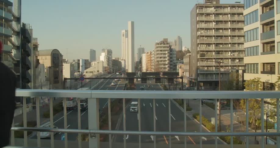 Man walks across a bridge