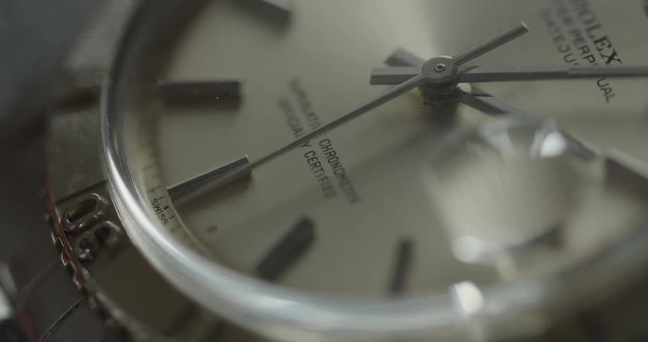 A clock is ticking on a watch