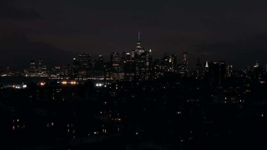 Vehicle headlights help light up a city at night