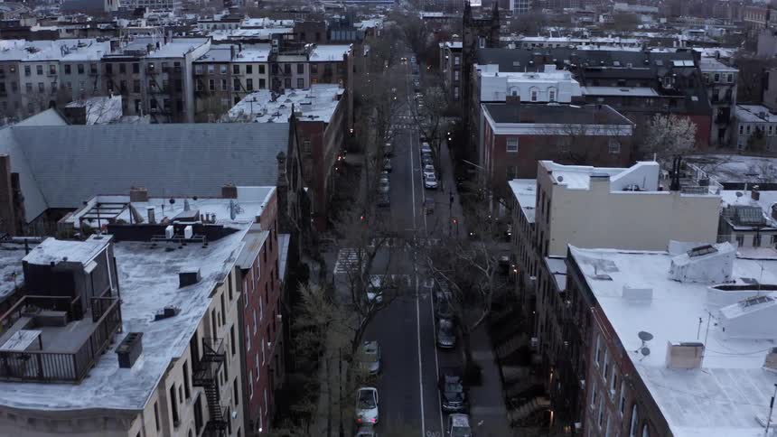 Cars Line an Empty Street