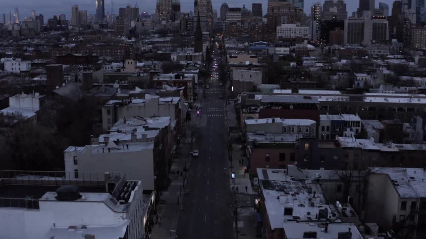 Aerial View of Streets and City Skyline