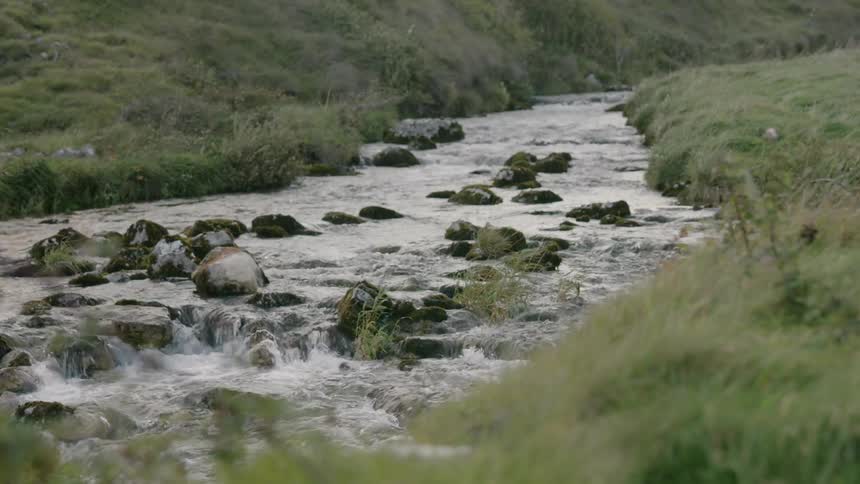 Stream flows down naturally along a fixed route