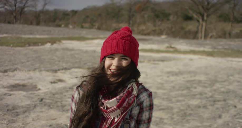 A young woman smiling