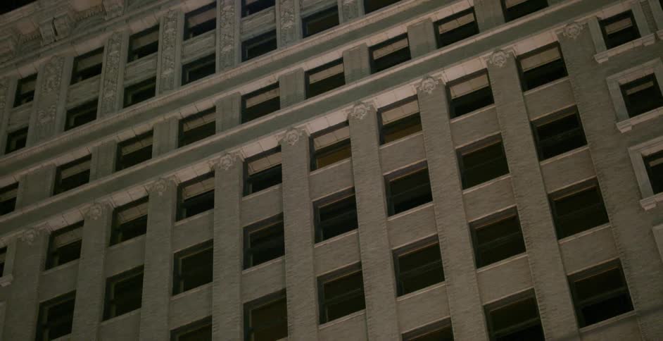 The neon sign on top of the walker center building in salt lake city flashes on and off