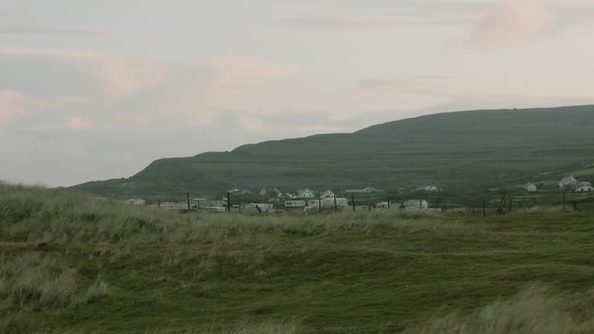 A grassland landscape is displayed at daytime