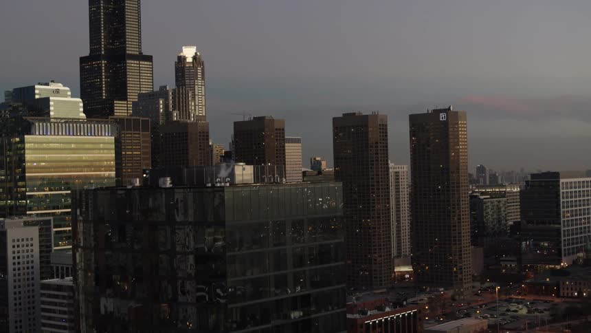 Tall building reflecting Chicago sunset