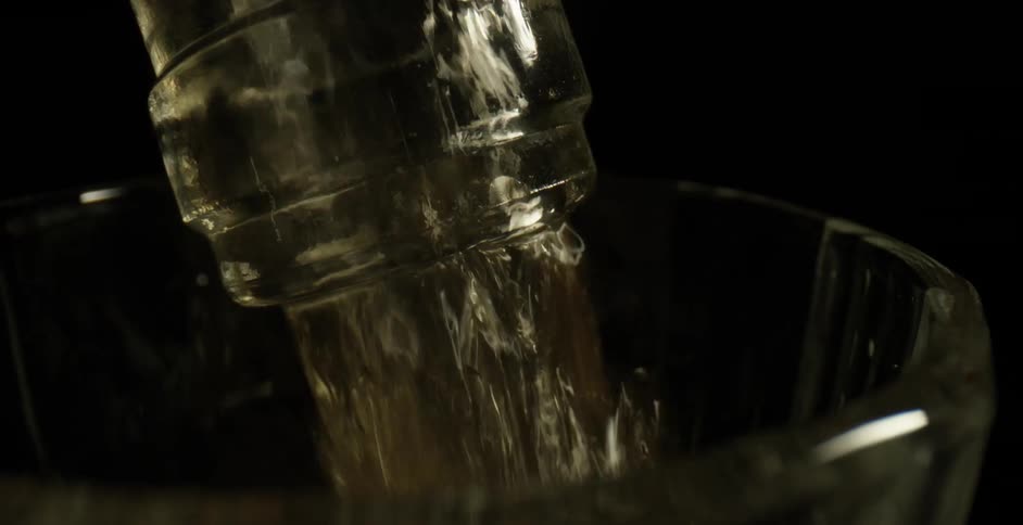 Water is being poured into a glass