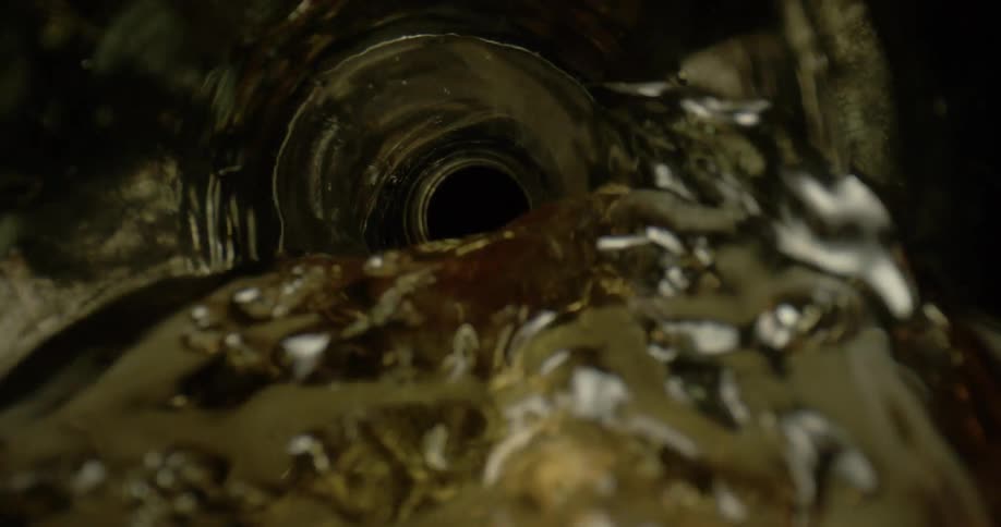 Water is being poured into a glass