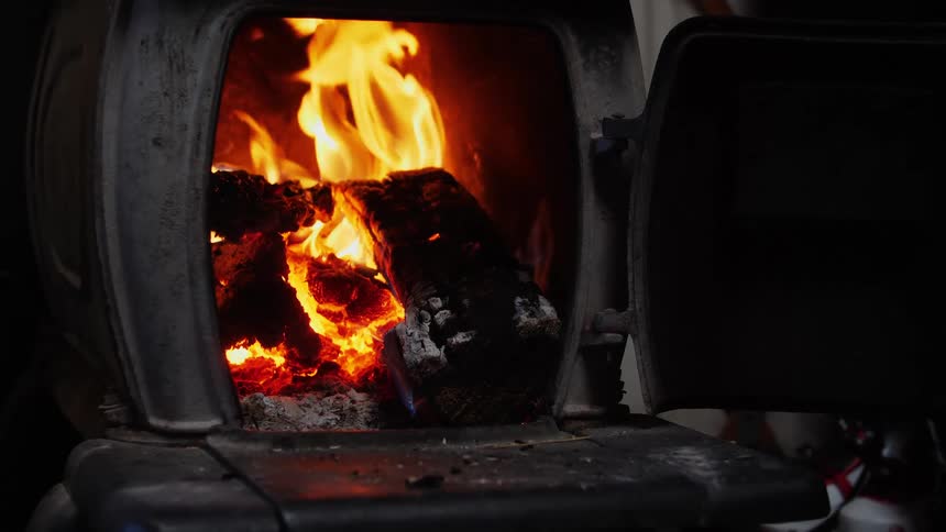 The wood is burning in the oven