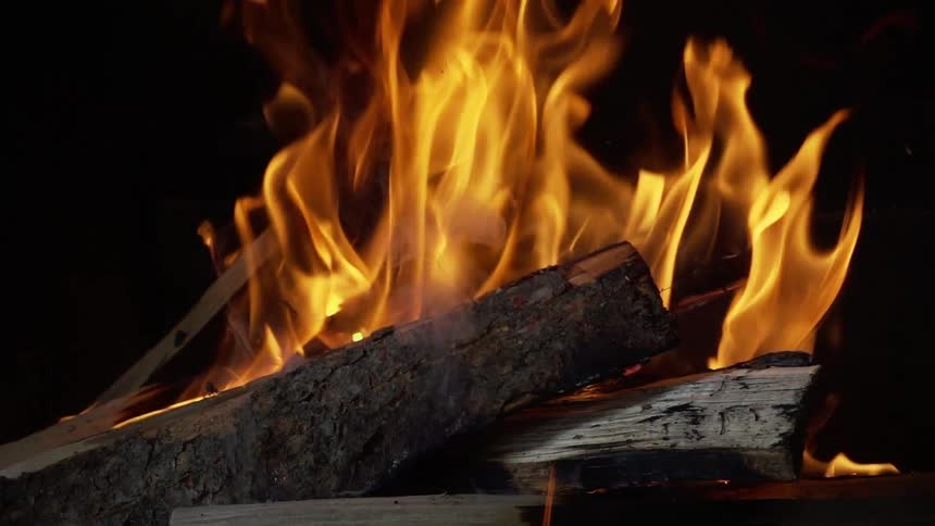 Close up of bonfire flames burning in slow motion