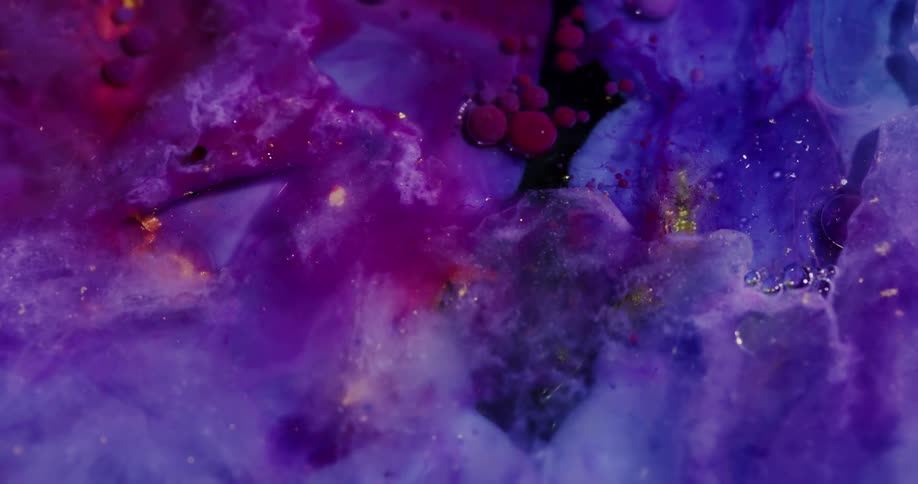 Colored liquid dyes mix together