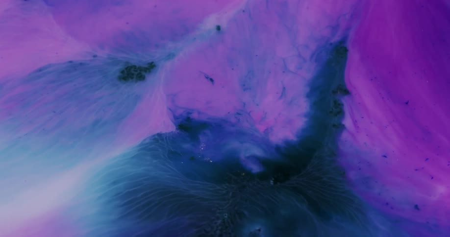 Colored dyes mixing together