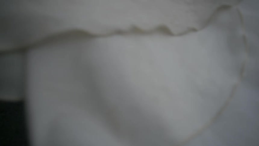 White fabric blows in the wind