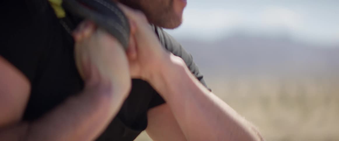 A man is pulling cables forward