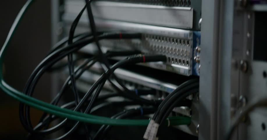 A cable being connected to a set of ports