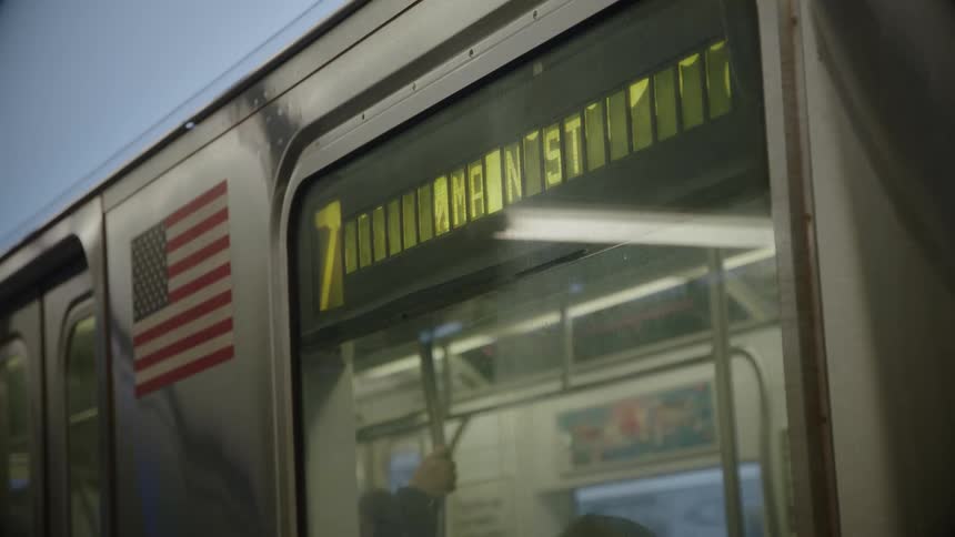 A subway train begins its journey